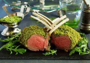 Rack of lamb in herb cheese and breadcrumbs. A festive meal. Selective focus.Rack of lamb in herb cheese and breadcrumbs. A festive meal. Selective focus.